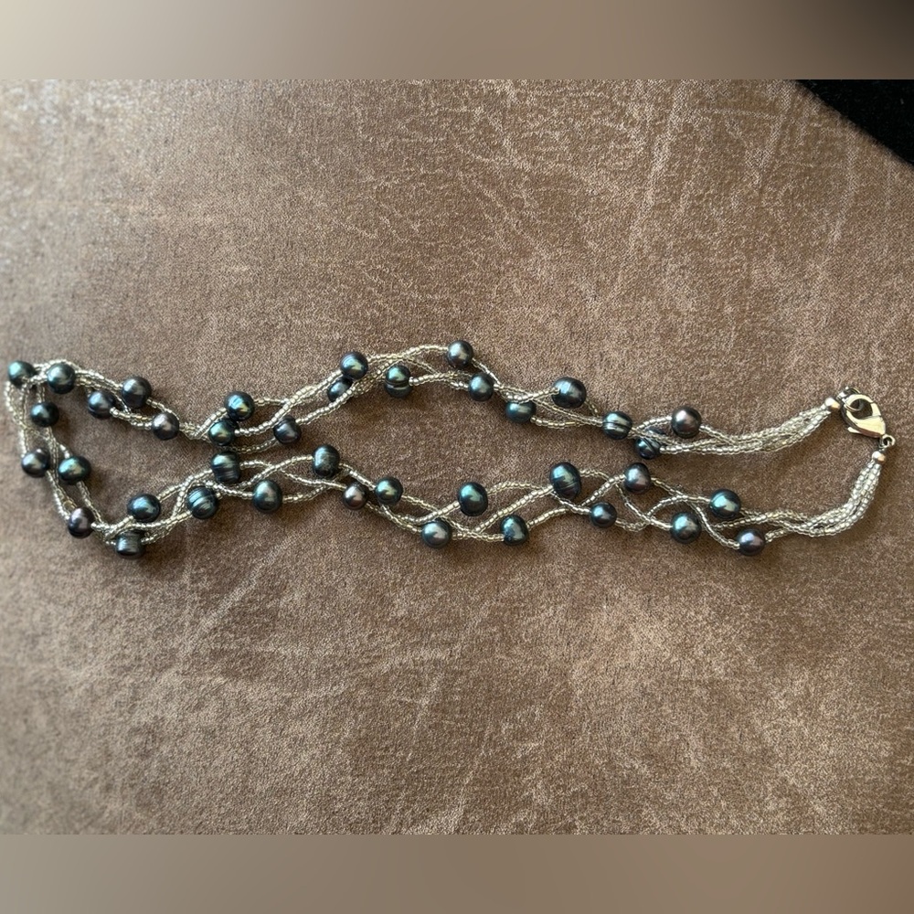 Seed bead and glass pearl necklace add some classy fun to your look